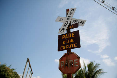 mata de sao joao, bahia / brazil - october 12, 2020: traffic signs indicate crossing of railway lines in the city of Mata de Sao Joao.のeditorial素材