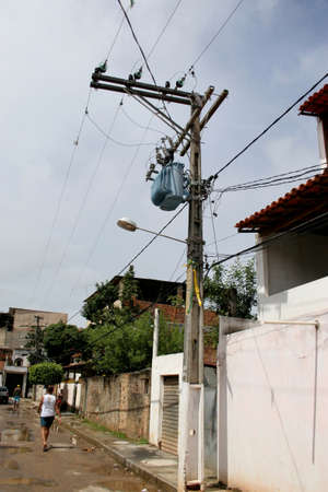 salvador, bahia / brazil - august 13, 2006: a transformer is seen on a pole in the city of Salvador.のeditorial素材