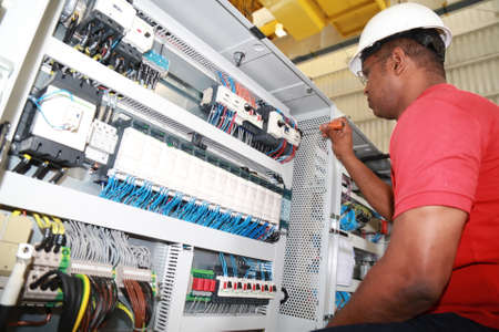 simoes fillho, bahia / brazil - May 13, 2015: employee is seen working at Acciona Windpower wind turbine factory in the city of Simoes Filho.のeditorial素材