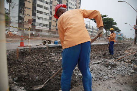 salvador, bahia / brazil - november 28, 2019: Workers are working on public roads requalification...