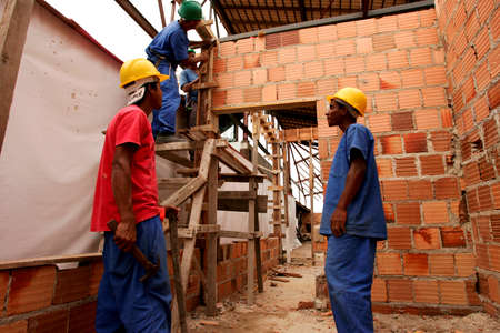 porto Seguro, bahia / brazil - november 10, 2010: civil construction workers are seen working on...