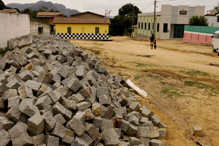 guaratinga, bahia / brazil - august 17, 2010: granite stones used for street paving in the district of Monte Alegre, in the city of Guaratinga.のeditorial素材