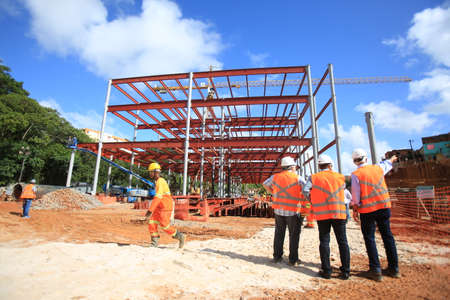 salvador, bahia / brazil - march 23, 2017: Workers seen at construction work of the bus terminal in the city Salvador.のeditorial素材