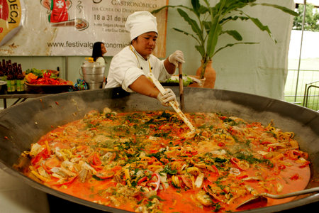 belmonte, bahia / brazil - september 11, 2008: chief cook prepares a giant fish stew in the city of Belmonte, in the south of Bahia.のeditorial素材