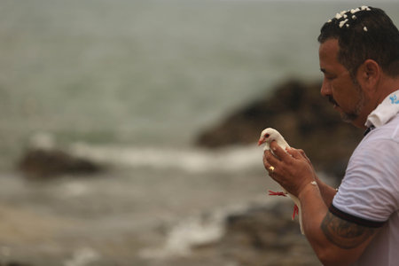 salvador, bahia / brazil - february 2, 2016: Candomble supporters and supporters greet the Yemanja orixa during a festan on the Rio Vermelho neighborhood beach in Salvador.のeditorial素材