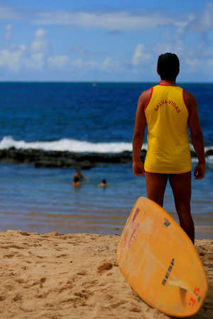 salvador, bahia / brazil - March 3, 2014: Lifeguards are seen at Barra beach in Salvador.のeditorial素材