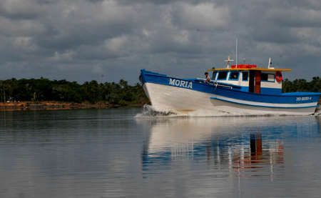 caravelas, bahia / brazil - march 25, 2008: fishing boats are seen near the port of the city of caravelas.のeditorial素材