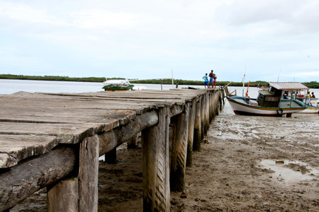 caravelas, bahia / brazil - june 16, 2009: wooden pier to access the port of fishing boats on the Caravelas River in the city of Caravelas, in the south of Bahia.のeditorial素材