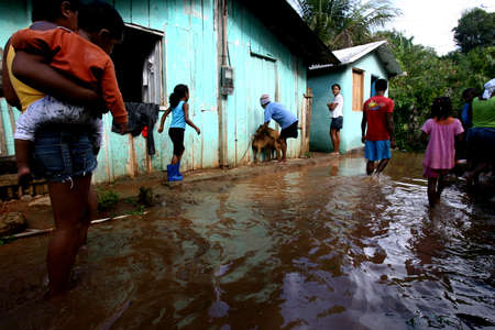 ilheus, bahia / brazil - october 25, 2011: Santana River flooding floods houses in Rio do Engenho district, Ilheus municipality. families were housed in a local public school.のeditorial素材
