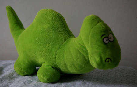 salvador, bahia / brazil - july 9, 2020: plush dinosaur is seen in the city of Salvador.の写真素材