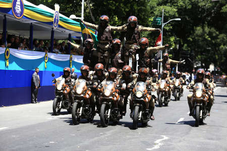 salvador, bahia / brazil - september 7, 2016: Military policemen make a human pirame on motorcycles during Civic-Military Parade on Brazil Independence Day.のeditorial素材