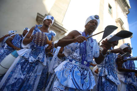 salvador, bahia / brazil - february 5, 2018: members of the Filhos of Ganhy are seen during a presentation at Pelourinho, Historic Center of the city of Salvador.のeditorial素材