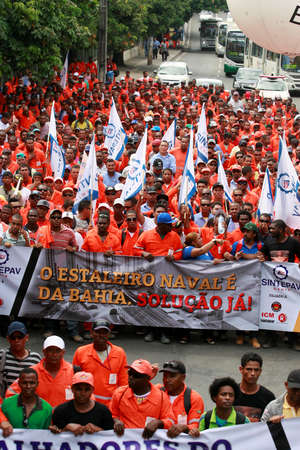salvador, bahia / brazil - december 11, 2014: workers laid off at the Paraguacu shipyard in Maragogipe demonstrate in the city of Salvador.のeditorial素材