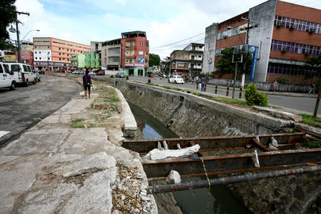 itabuna, bahia, brazil - february 14, 2012: workers work on the construction of drainage channel in the city of Itabuna.のeditorial素材