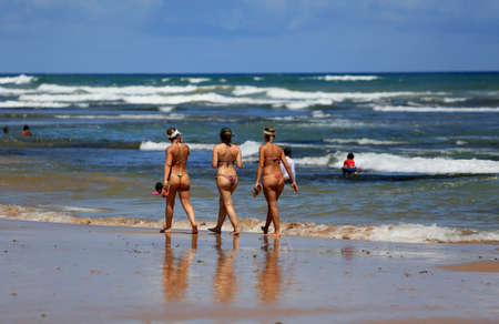 salvador, bahia / brazil - december 22, 2015: women are seen in bikinis on Stella Mares beach in the city of Salvador.のeditorial素材