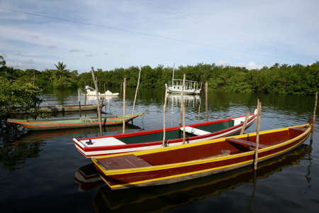 camamu, bahia / brazil - january 10, 2012: canoes are seen in Baia de Camamu, in the city of Camamu, in southern Bahia.のeditorial素材
