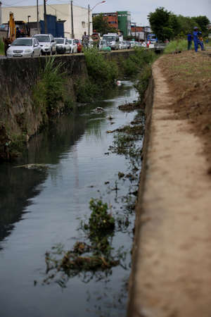 simoes filho, bahia / brazil - Nnovember 13, 2017: View of home sewage system directed to Muriquerios River in Simoes Filho.のeditorial素材