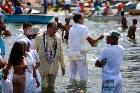 salvador, bahia / brazil - February 2, 2015: Candomble supporters and supporters greet the Yemanja orixa during a festan on the Rio Vermelho neighborhood beach in Salvador.のeditorial素材