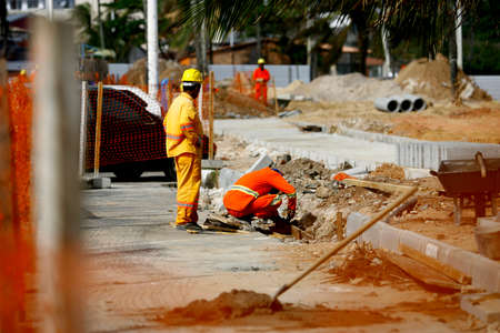 salvador, bahia / brazil - august 6, 2014: Workers are seen working on renovating the Itapua...