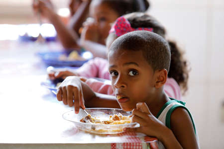 pojuca, bahia / brazil - August 1, 2019: School lunch is served to public school students in the city of Pojuca.のeditorial素材