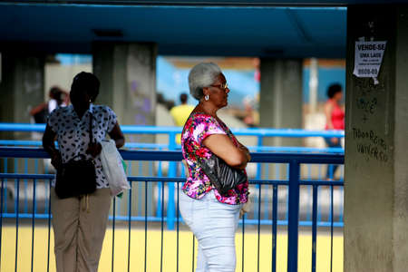 salvador, bahia / brazil - january 5, 2015: Seniors are seen waiting for public transport buses at Lapa Station in Salvador.のeditorial素材