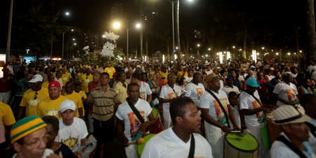 salvador, bahia / brazil - july 2, 2017: People follow the departure of Caboclo and Cabocla from the Campo Grande neighborhood, after the July 2 celebrations, symbolizing Bahia Independence Day.のeditorial素材
