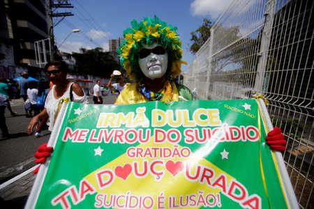 salvador, bahia / brazil - October13, 2019: Devotees arrive at Fonte Nova Arena in Salvador, for Mass in honor of Sister Dulce. The nun was canonized by Pope Francis.のeditorial素材