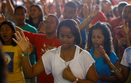 salvador, bahia / brazil - august 31, 2014: Young catholics are seen during religious congress in the city of Salvador.のeditorial素材