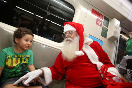 salvador, bahia / brazil - october 29, 2018: Santa Claus is seen arriving at a mall in the city of Salvador. arrival of santa claus in shopping mall.のeditorial素材