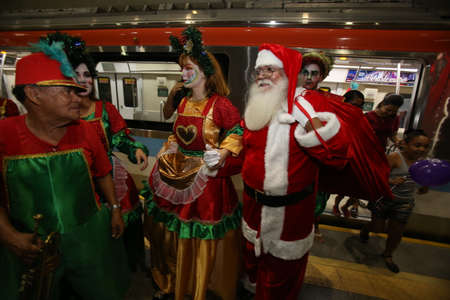 salvador, bahia / brazil - october 29, 2018: Santa Claus is seen arriving at a mall in the city of Salvador. arrival of santa claus in shopping mall.のeditorial素材