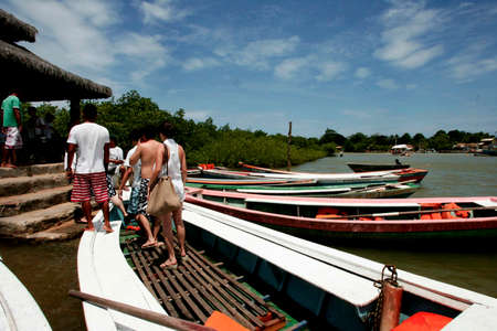 porto Seguro, bahia / brazil - november 4, 2009: Tourist transport vessels are seen in the port of Rio Caraiva, Porto Seguro district.のeditorial素材