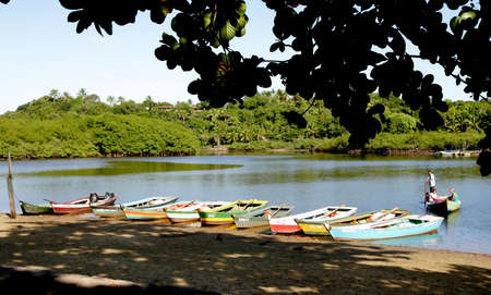 porto Seguro, Bahia / Brazil - February 26, 2011: boats are seen in the waters of the Caraiva River in the Caraiva district in the municipality of Porto Seguro.のeditorial素材