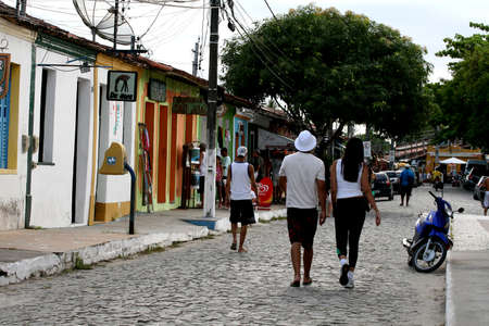 porto Seguro, bahia / brazil - january 3, 2008: people are seen walking down the street in the...