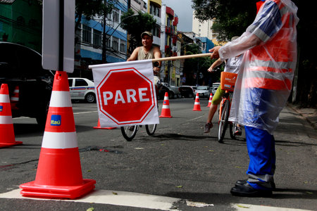 salvador, bahia / brazil - september 22, 2013: people are seen riding a bicycle in the public bicycle rental system in the city of Salvador.のeditorial素材