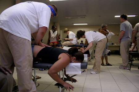 salvador, bahia / brazil - march 1, 2007: person is seen doing chiropractic activities on a patient in the city of Salvador.のeditorial素材