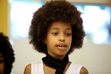 salvador, bahia / brazil - october 13, 2017: child with black power hair is seen in the Liberdade neighborhood in the city of Salvador.のeditorial素材
