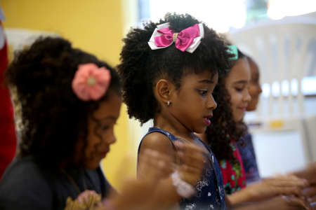 salvador, bahia / brazil - october 13, 2017: child with black power hair is seen in the Liberdade neighborhood in the city of Salvador.のeditorial素材