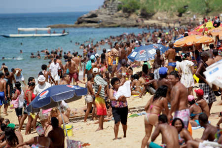 salvador, bahia / brazil - january 1, 2015: people are seen bathing on the Boa Viagem beach in the city of Salvador.のeditorial素材