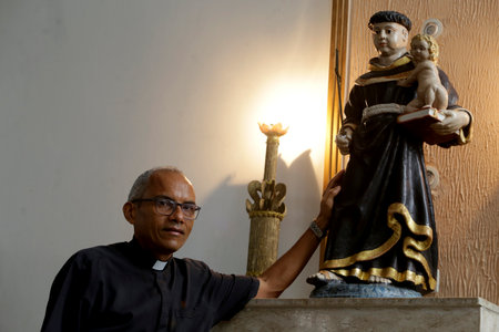 salvador, bahia / brazil - june 6, 2019: Edimilson Lima, parish priest of the Santo Antonio Church, in the Cosme de Farias neighborhood in the city of Salvador.のeditorial素材