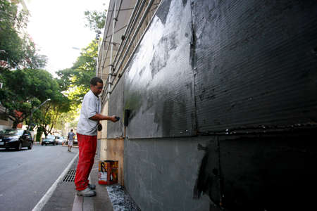 salvador, bahia / brazil - february 11, 2015: Workers are seen working on setting up a stage structure in the Campo Grande neighborhood for the carnival in the city of Salvador.のeditorial素材