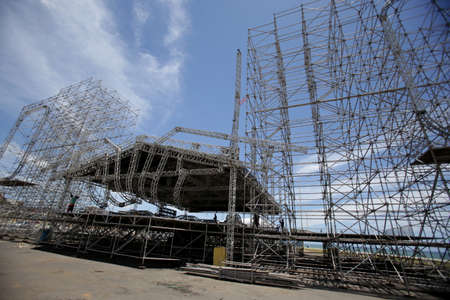 salvador, bahia / brazil - february 11, 2015: Workers are seen working on setting up a stage structure in the Campo Grande neighborhood for the carnival in the city of Salvador.のeditorial素材