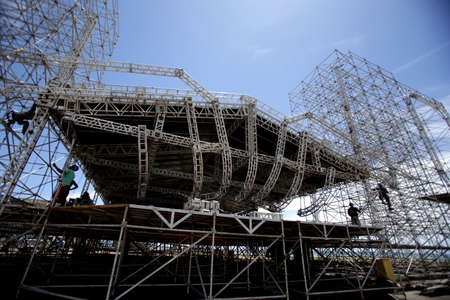 salvador, bahia / brazil - february 11, 2015: Workers are seen working on setting up a stage...