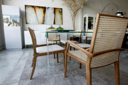 salvador, bahia / brazil - april 1, 2015: Dining room with Mia chair (upholstered) and also with Bend chair is seen in a store in the city of Salvador.のeditorial素材