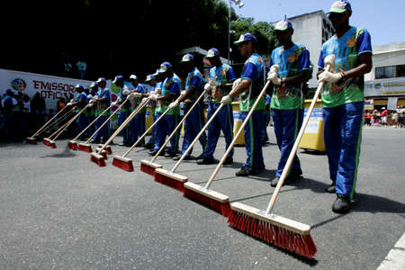 salvador, bahia / brazil - february 10, 2013: street sweepers clean the Osmar Circuit during the Carnival in the city of Salvador.のeditorial素材