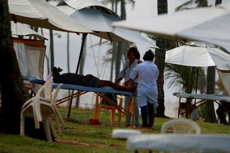 salvador, bahia / brazil - june 26, 2015: masseuse seen working on stretcher in Jardim de Alah in the city of Salvador.のeditorial素材