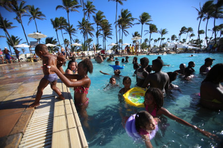 salvador, bahia / brazil - october 23, 2017: Movement in the pool of the Sesc Summer Camp in the Piata neighborhood of Salvador, during the holidays of traders.のeditorial素材