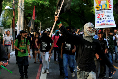 salvador, bahia / brazil - september 12, 2014: young people are seen during a demonstration against the FIFA World Cup in Brazil. the action takes place in the city of Salvador.のeditorial素材