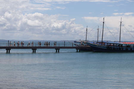 salvador, bahia / brazil - january 31, 2019: Passengers are seen at the pier of Ilha dos Frades schooning for schooner for a nautical ride through the Bay of All Saints.のeditorial素材