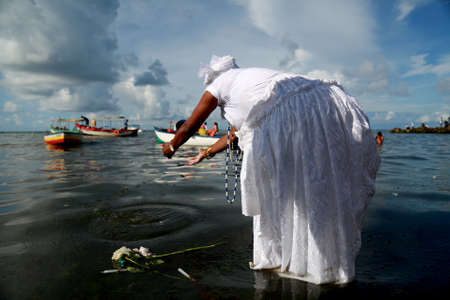 salvador, bahia, brazil - february 2, 2014: member of the candomble religion participates in a party in honor of Yemanja in the city of Salvador.のeditorial素材