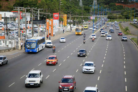 salvador, bahia, brazil - february 23, 2021: moving vehicles on a street in the Pituba neighborhood in the city of Salvador.のeditorial素材